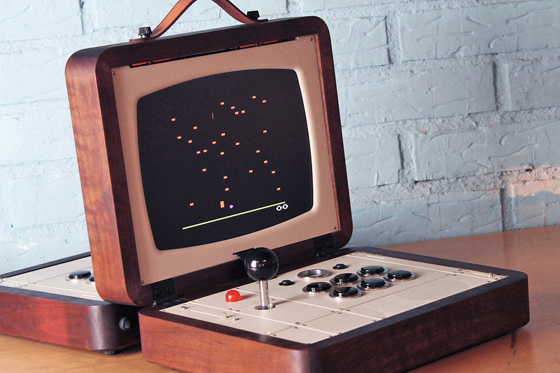 Illustration for article titled Inspired by Battleship, This Head-to-Head Portable Arcade Is a Work of Art